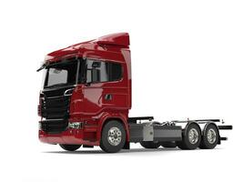 modern mörk röd tung transport lastbil utan en trailer foto