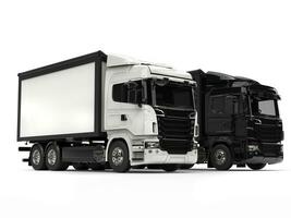 svart och vit modern tung transport lastbilar foto