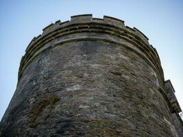 gammal celtic slott torn, kork stad fängelse fängelse i irland. fästning, citadell bakgrund foto