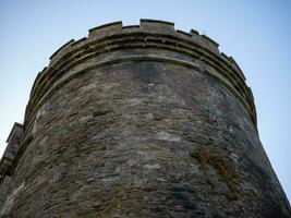 gammal celtic slott torn, kork stad fängelse fängelse i irland. fästning, citadell bakgrund foto