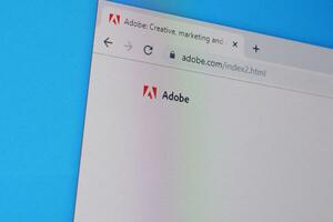 hemsida av adobe hemsida på de visa av pc, url - adobe.com. foto