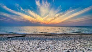 solnedgång på de strand av sjö Michigan i dalgång berså, Michigan foto