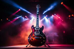 elektrisk gitarr på skede i de strålar av strålkastare. sten konsert foto