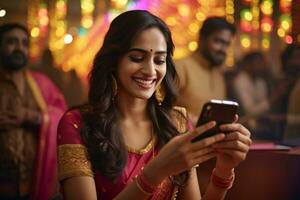 en bild av en Lycklig kvinna i en traditionell indisk klänning använder sig av henne telefon under de diwali festival, ai generativ foto