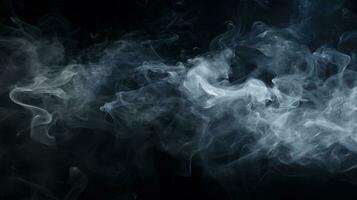 en puff av rök på en svart bakgrund foto