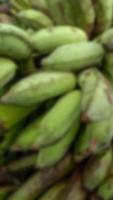 oskärpa foto av bananfrukt med färsk grön färg