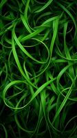 en knippa av grön gräs på en svart bakgrund generativ ai foto