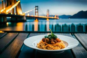 en tallrik av spaghetti med köttbullar och en se av de gyllene Port bro. ai-genererad foto