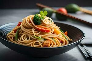 en skål av spaghetti med grönsaker och ätpinnar. ai-genererad foto