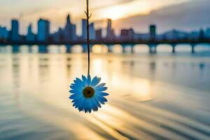 en enda blomma hängande från en sträng i främre av en stad horisont. ai-genererad foto