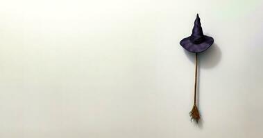 lila häxa hatt hängande på vägg Nästa till kvast och kvast pinne. generativ ai foto