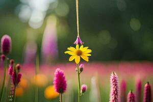 en gul blomma är hängande från en sträng i en fält. ai-genererad foto