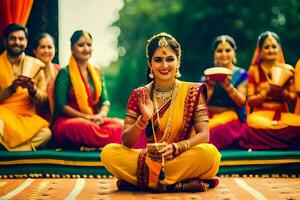 en kvinna i traditionell indisk klädsel sitter på de jord med henne vänner. ai-genererad foto