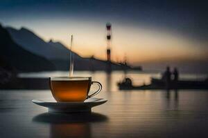 en kopp av te på en tabell i främre av en sjö. ai-genererad foto