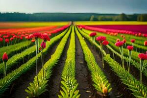 en fält av röd och rosa blommor. ai-genererad foto