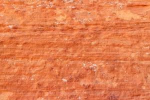 grov röd sten textur bakgrund. foto