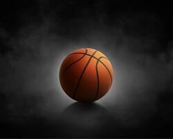 basketboll med på svart bakgrund med rök foto