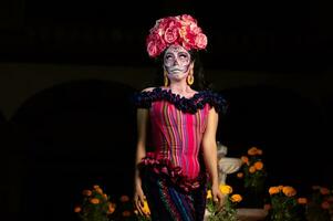 calavera catrina Sammanträde på en tron. socker skalle smink. dia de los muertos. dag av de död. halloween. foto