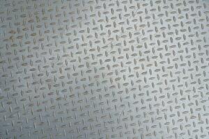 metall golv tallrik med diamant mönster. metall bakgrund eller stål textur abstrakt. foto
