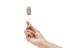 kvinna hand innehav en silver- rostfri gaffel närbild Foto isolerat på vit bakgrund