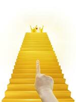 hand pekande på de gyllene krona på de gyllene trappa foto
