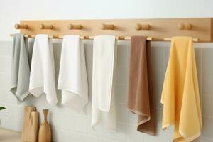hygienisk kök färgrik handdukar hängande på kuggstång. generera ai foto