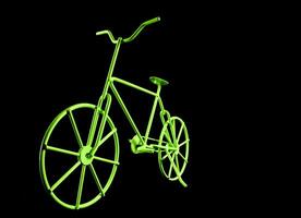 en neon grön cykel är visad mot en svart bakgrund foto