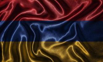 tapet av armeniens flagga och viftande flagga av tyg. foto