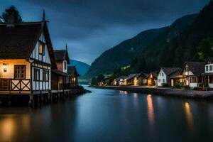 en flod i de bergen på natt med hus längs de vatten. ai-genererad foto