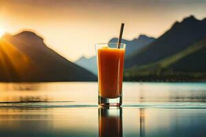 en glas av orange juice på de kant av en sjö med bergen i de bakgrund. ai-genererad foto