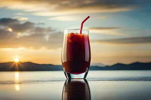 en glas av röd juice på de strand på solnedgång. ai-genererad foto