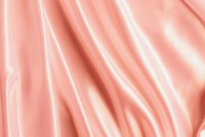 abstrakt rosa guld satin silkeslen tyg för bakgrund foto