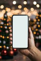 en hand innehar en svart smartphone med en tom skärm på en jul bakgrund.kopia space, mockup.generative ai foto