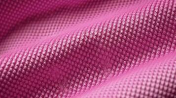 rosa fotboll tyg textur med luft maska. sportkläder bakgrund foto