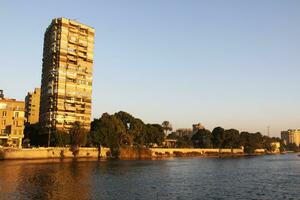 solnedgång cairo från de flod nile bro foto