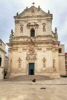 se av de basilika av san martino i barock arkitektur i piazza folkomröstning, martina franca. foto