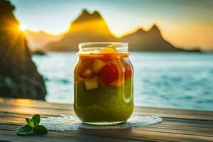 en glas av grön juice med frukt på en tabell i främre av de hav. ai-genererad foto