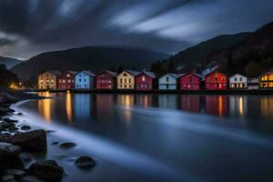 färgrik hus på de Strand av en sjö på natt. ai-genererad foto