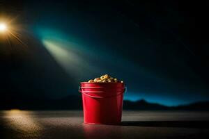 en röd hink fylld med popcorn på en mörk yta. ai-genererad foto