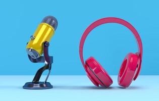 gul podcastmikrofon och rosa hörlurar på blå bakgrund foto