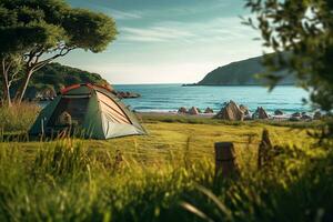 camping tält och camping Utrustning på grön gräs med hav se bakgrund ai genererad foto