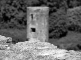 gammal sten över gammal torn bakgrund, blarney slott i Irland, gammal gammal celtic fästning foto