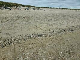 visningar av de ändlös strand på de nordlig hav i blavand Danmark foto