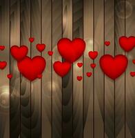 röd hjärtan på brun trä- bakgrund foto