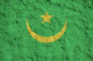 mauretanien flagga avbildad i ljus måla färger på gammal lättnad putsning vägg. texturerad baner på grov bakgrund foto