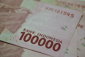 indonesiska valuta ett hundra tusen rupiah foto