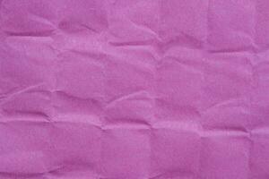 skrynkligt rosa papper textur som bakgrund foto