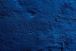 vägg cement bakgrunder texturer. gammal vägg mönster textur cement blå mörk. skön textur dekorativ stuck. foto