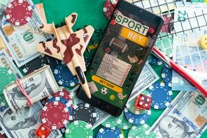 inskrift din slå vad vinner på en smartphone på de poker tabell. satsningar, sporter vadhållning, bookmaker. blandad media. foto