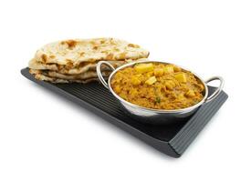 norr indisk friska kök chole paneer eller chole paneer curry eras med tandoori roti foto